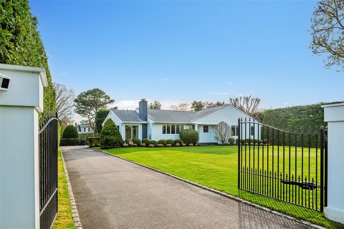 View of front of house featuring a chimney