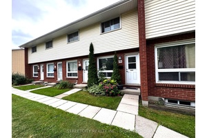 This 2 bedroom, 2 bathroom two story condo townhome is minutes from shopping and amenities and comes with its own parking space.