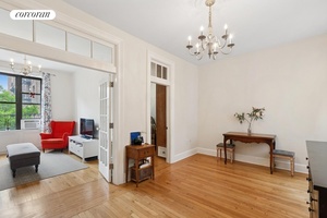 Move right in. Renovated, sunny corner apartment has windows in every room, open city and tree top views, plus east, south and west exposures providing light all day.