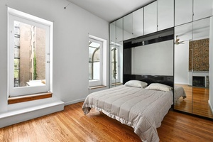 Come home to this large alcove studio plus a huge private roof terrace.