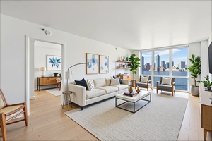 Breathtaking Hudson River Views Two Bedroom Home Office at The Solaire Co op with Condo rules.