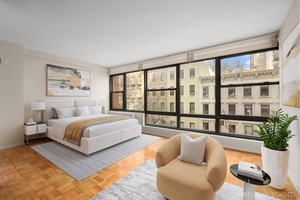 Overlooking a row of stone clad townhouses, this sun filled studio is the perfect place to call home.