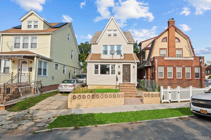 View of front of property with a fenced front yard