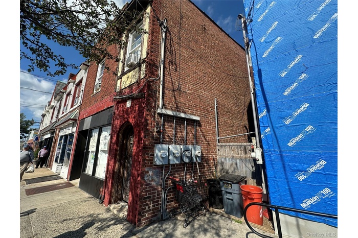 View of home's exterior featuring brick siding