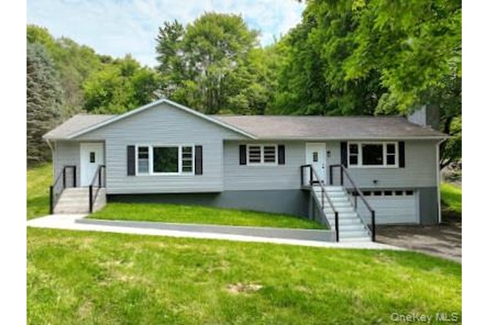Ranch-style home and front lawn