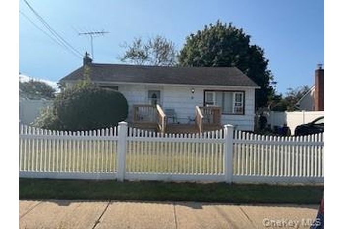 View of front of house with a fenced front yard