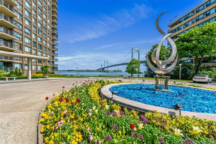 View of community featuring a water view