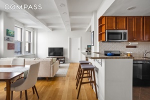Spacious and bright, this pre war co op in NoMad offers high ceilings, oversized windows, and a flexible layout.