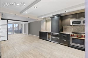 Step into a realm of unparalleled elegance with this uniquely renovated one bedroom apartment, a true gem within the building.