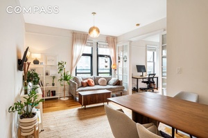 This charming prewar two bedroom home office or easily convertible three bedroom apartment features oversized windows in the main living spaces and a recently renovated kitchen and bathroom.