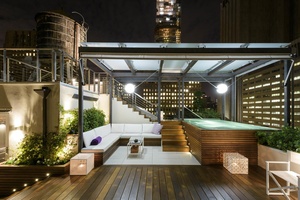 One of a kind, renovated, Penthouse Loft with an enormous tiered private roof terrace with exceptional views, sun and pool.