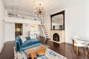 Welcome to this charming 25 ft wide townhouse co op with an elevator, perfectly situated just off Park Avenue on a beautiful, townhouse lined block.