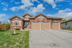Welcome to this beautiful brick front bungalow, built in 2012 and designed with comfort and convenience in mind.
