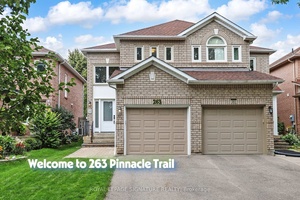 Welcome to 263 Pinnacle Trail Nestled on a tree lined street in the prestigious St.