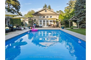 Welcome to 1522 Glenhill Crescent in the prestigious Lorne Park, where timeless charm meets resort style living on a generous 80 x 155 ft lot.