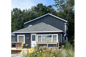 Welcome to 412 Limerick Crescent in Innisfil a rare opportunity just steps from Cooks Bay and Gilford Beach, with dock access for boating and fishing.