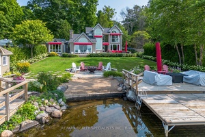 BALSAM LAKE Stunning Turnkey Waterfront Retreat This spectacular 5 bedroom, 3 bathroom fully furnished home on Balsam Lake offers luxury lakeside living at its finest.