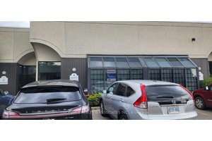 First Time Offered, Nicely Finished Unit Consisting of Two Offices, Large Work Area, Showroom and Two Washrooms, Kitchenette, with Large Mezzanine Over Office Area Not Included in Square Footage.