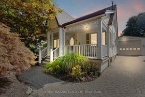 Spectacular North End Home with Main Floor Luxury amp ; Dream Garage Experience the ease of main floor living with a spacious primary retreat featuring a walk in closet and ...