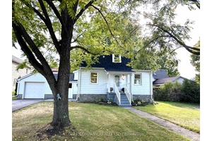 Welcome to this 1930 built home in the heart of Almonte, set on a large lot with mature trees in the front yard.