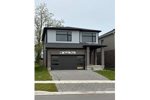 South London two storey home featuring 4 bedrooms, 3 bathrooms, and a double car garage.