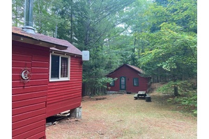 Two 2 bedroom1960s vintage cottages and a bunkie located on an acre of land on a premier lake with a fabulous western exposure providing beautiful sunny afternoons and great sunsets ...