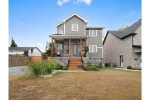 Nearly new, this impeccably finished 2 storey home offers a bevy of features that are difficult to find.