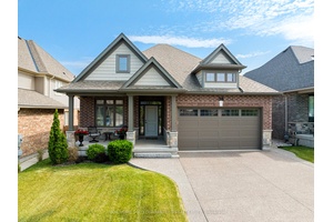 MODERN BUNGALOW BACKING ONTO TRANQUIL GREEN SPACE WITH WALKOUT BASEMENT WITH ALL FURNITURE INCLUDED !