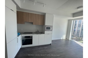 one bedroom suite featuring a spacious balcony, open concept layout, and modern finishes.