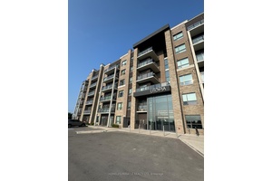 Enjoy modern living in this beautifully designed condo featuring an open concept layout, large windows for plenty of natural light, and high end finishes throughout.