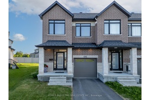 Welcome to your dream corner end unit townhome with a single driveway, nestled on a generous lot that offers both privacy and space 2297sqft of living space.