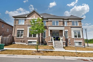 Spacious amp ; Bright End Unit Freehold Townhome Situated on a Premium Corner Lot with No Homes in Front !