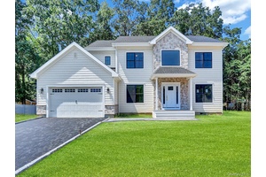 This is a rare opportunity to own new construction in Setauket, featuring a 2891 square foot custom Colonial set on a quiet cul de sac on a.
