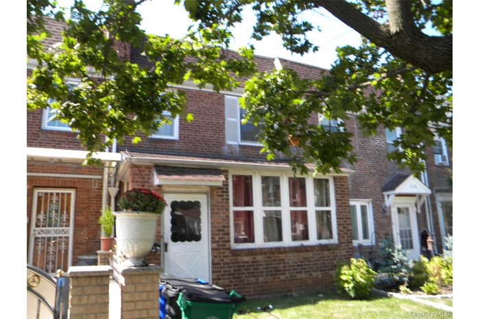 View of front facade featuring brick construction