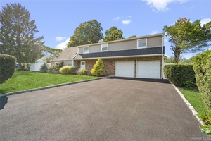 Stunning Colonial in the heart of Selden Oaks.