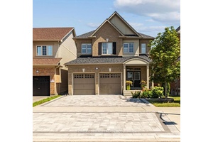 Welcome to this elegantly landscaped, masterfully crafted Tribute home in the sought after Winfield's community.