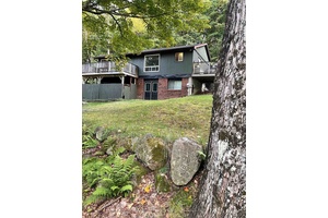 This charming bungalow sits on a quiet dead end road.