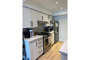 Fully renovated stacked Townhouse, Laminate on both floors 2 Bed and 2 bathrooms, Pot lights and open concept, natural sunlight, Beautiful kitchen with Stainless steel appliances, Close to all amenities.