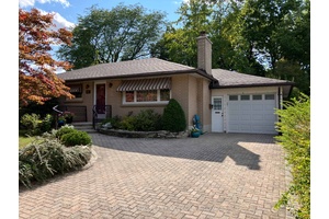Welcome to 465 Ridgewood Crescent a charming 3 bedroom 2 bathroom bungalow, with a main floor featuring a living room with a fireplace, an open concept kitchen and dining room, ...