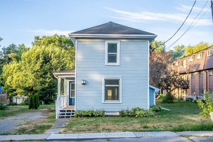 Welcome to 21 Downes Avenue, a beautifully refreshed country style 2 storey home in the heart of Prince Edward County.