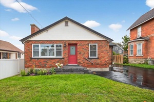 Recently renovated brick bungalow on lovely lot, close to shopping, hospital, transit and parks.