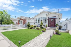 Welcome home ! ! This wonderful and spacious 4 bedroom 2 bath mid block gem is now available.