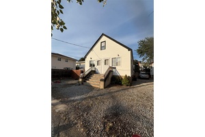 Welcome to 3 4th Street, Bayville, NY This is A Legal 2 Family Duplex that offers the ideal blend of comfort and investment potential.