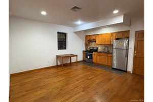 Welcome to this rare gem in the heart of Flushing, Queens.
