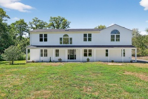 Discover this beautifully updated, modern style home offering an open floor plan with 5 spacious bedrooms and 4 bathrooms.
