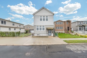 Humongous 2 Family Cottage on Oversized Lot with 4 Car Garage !