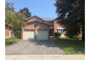 Tastefully Updated Detached Home Nestled On A Quiet Street In Desireable Glen Abbey Neighbourhood.