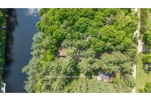 Escape to peace and privacy at this serene all season waterfront home nestled along the stunning Severn River.