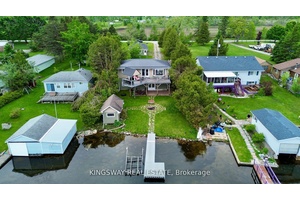 This year round raised bungalow offers 3 bedrooms and 2 full bathrooms, with 60 feet of frontage on Mitchell Lake.