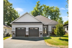 Welcome to this stunning custom built bungalow in the prestigious Chase Meadows community !